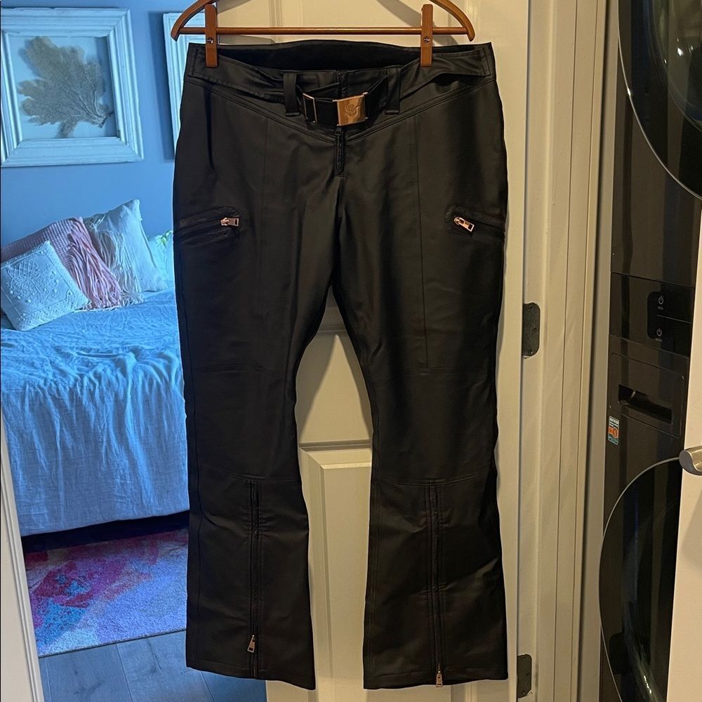 Black Under Armor Cold Gear Lindsey Vonn Ski and Board Pants with rose gold.